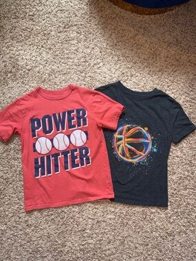 Size 7/7-8 boys bundle of 2 sports themed short sleeve t-shirts.